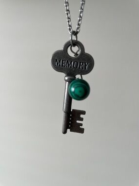 Hanging green striped stone with memory key necklace
